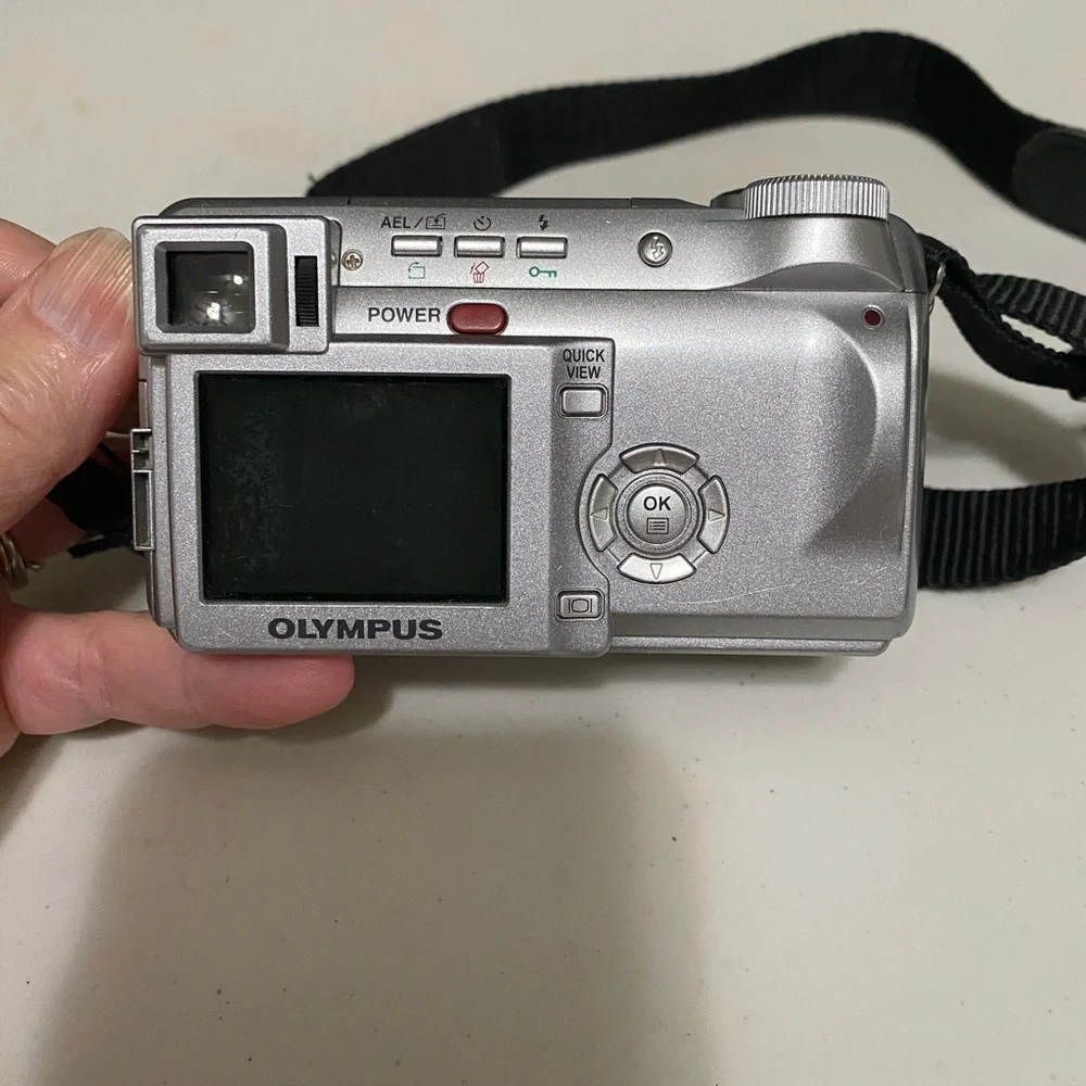 Olympus Silver Digital Camera with Charger